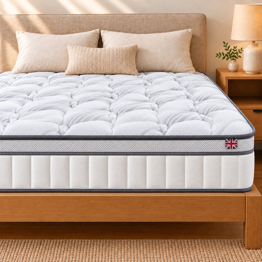 Lola Performance Hybrid Mattress on a wooden bed frame, made in the UK